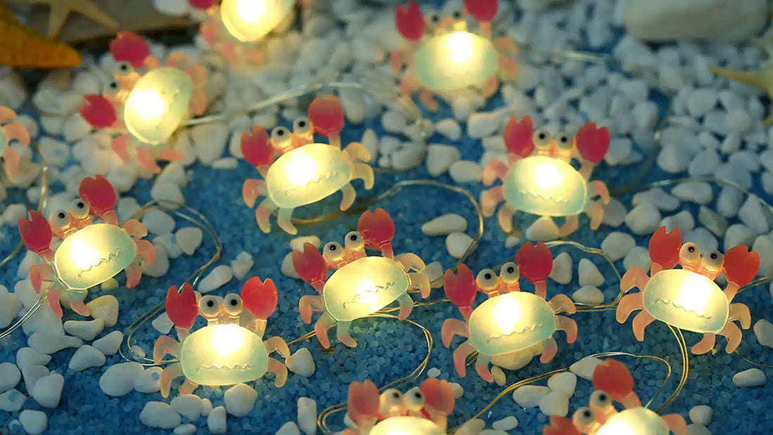 Ocean themed fairy lights on headboard, warm glow for coastal bedroom decor.