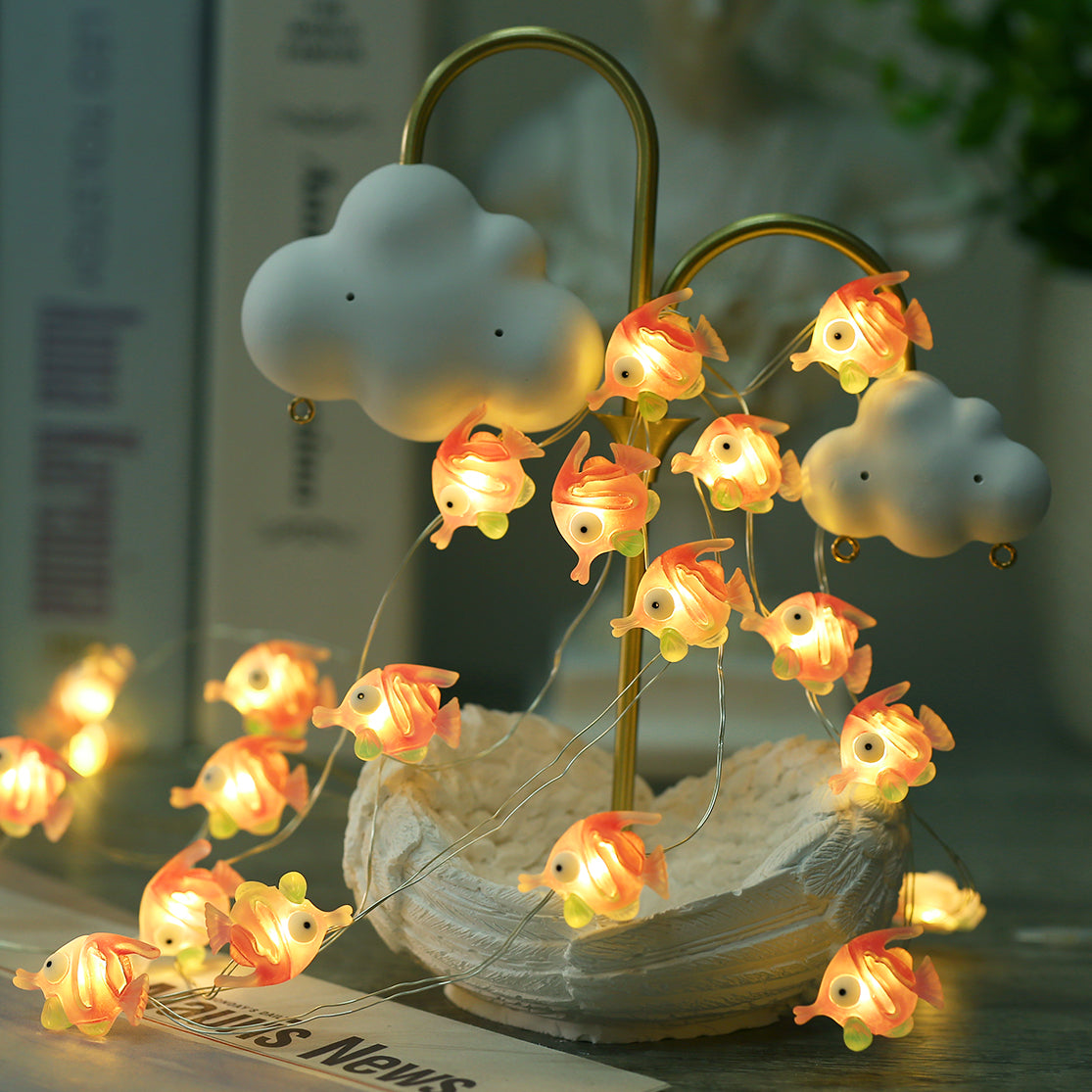 Close-up of Bubble Fish LED decorations on flexible copper wire