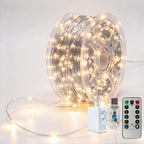 Silver-wire copper fairy lights on a reel with warm-white LEDs, USB controller, remote and power adapter