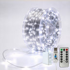 Silver-wire copper fairy lights on a reel with crisp-white LEDs, USB controller, remote and power adapter