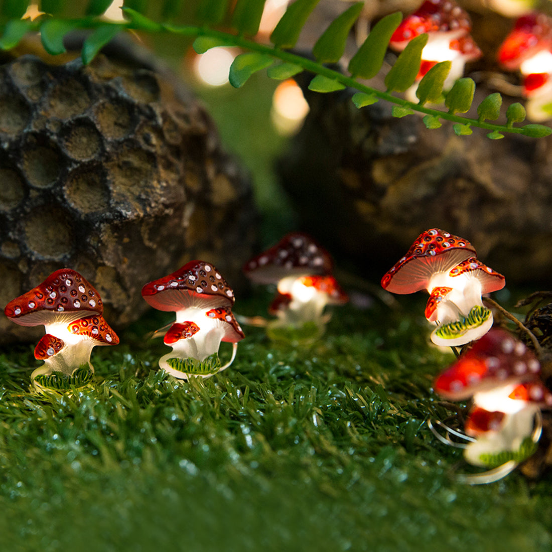 Close-up of Mushroom LED decorations on flexible copper wire