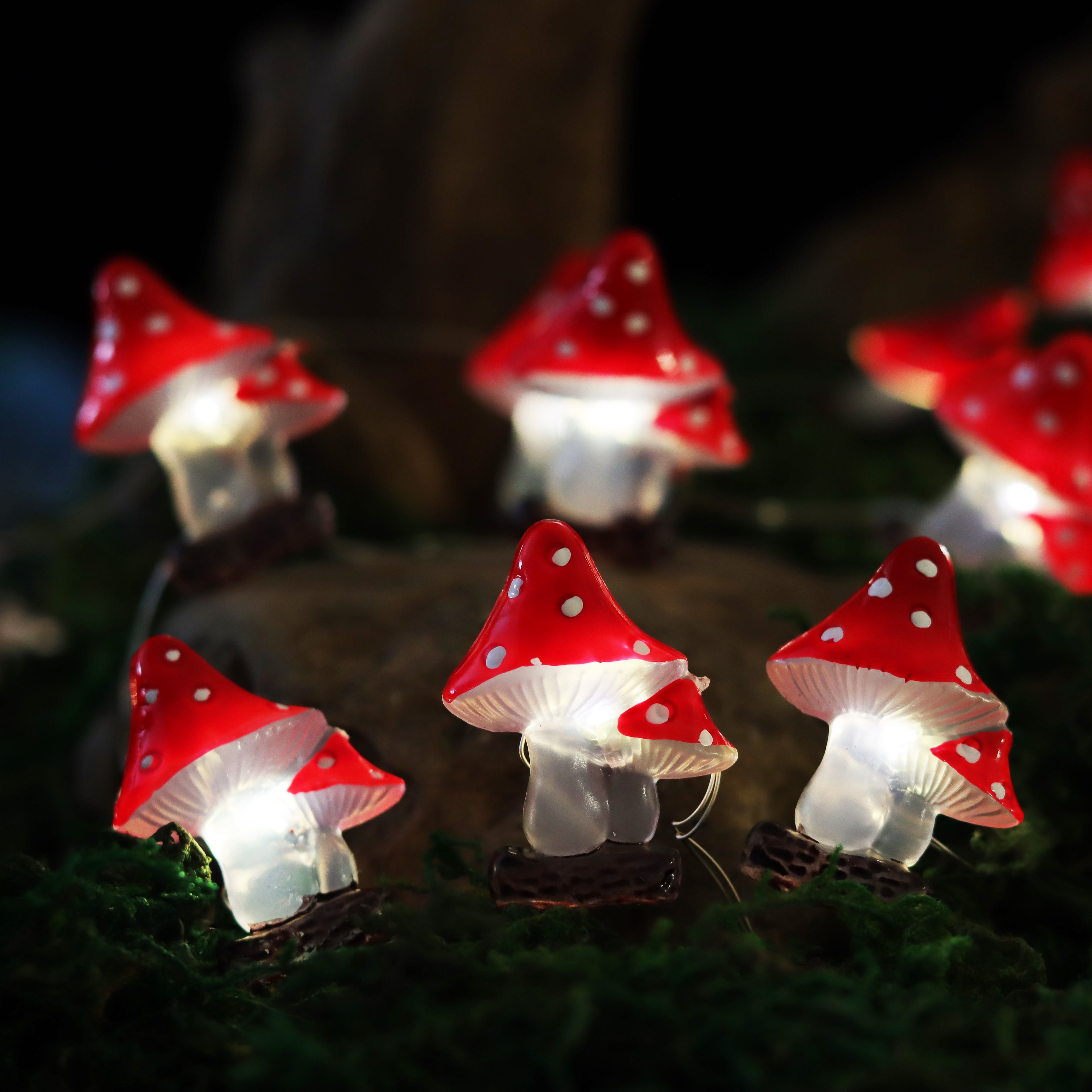 Close-up of Red Mushroom LED decorations on flexible copper wire